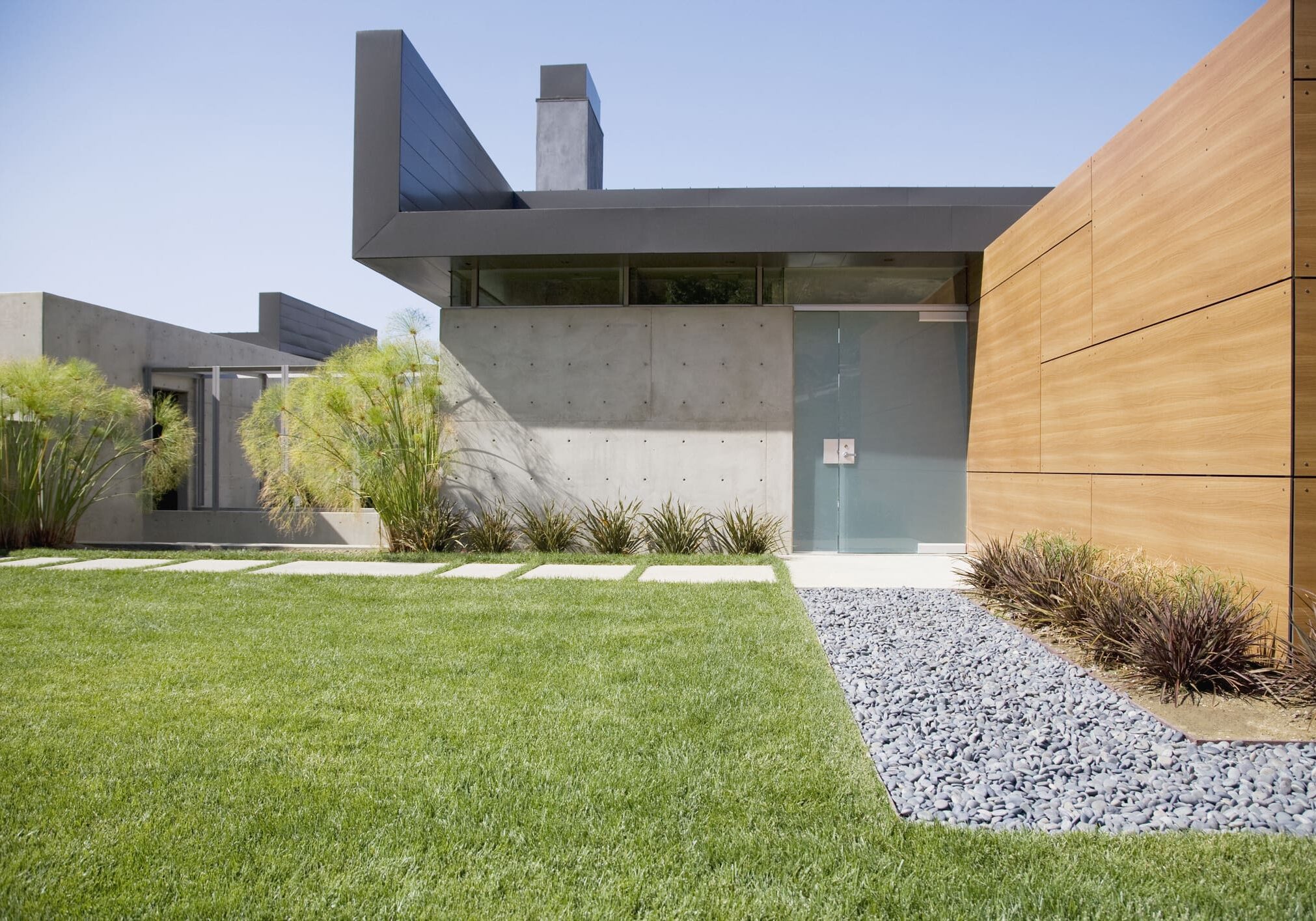 Contemporary architecture with lush green lawn
